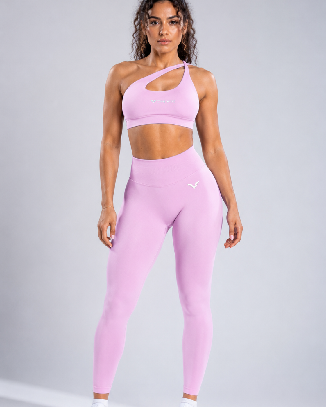 Woman wearing VONYX ALINE Quartz women’s gym leggings and sports bra